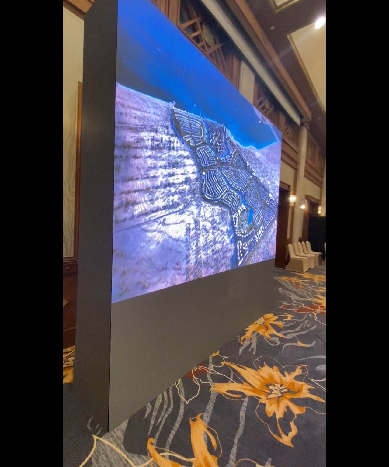 Large indoor LED wall at a private real estate event in Al Ain UAE